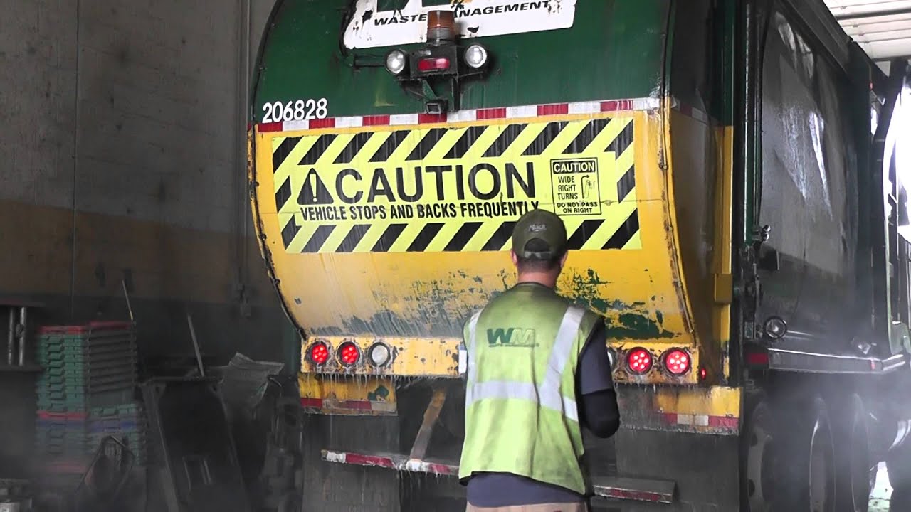 Washing Waste Management Trucks with Hydro Chem Systems brushless 2 Step Soaps.