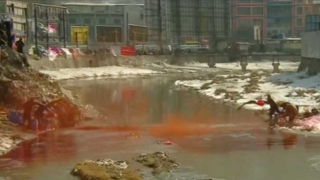 Protesters visualize Afghanistan&rsquo;s massive cost of war by turning Kabul River red