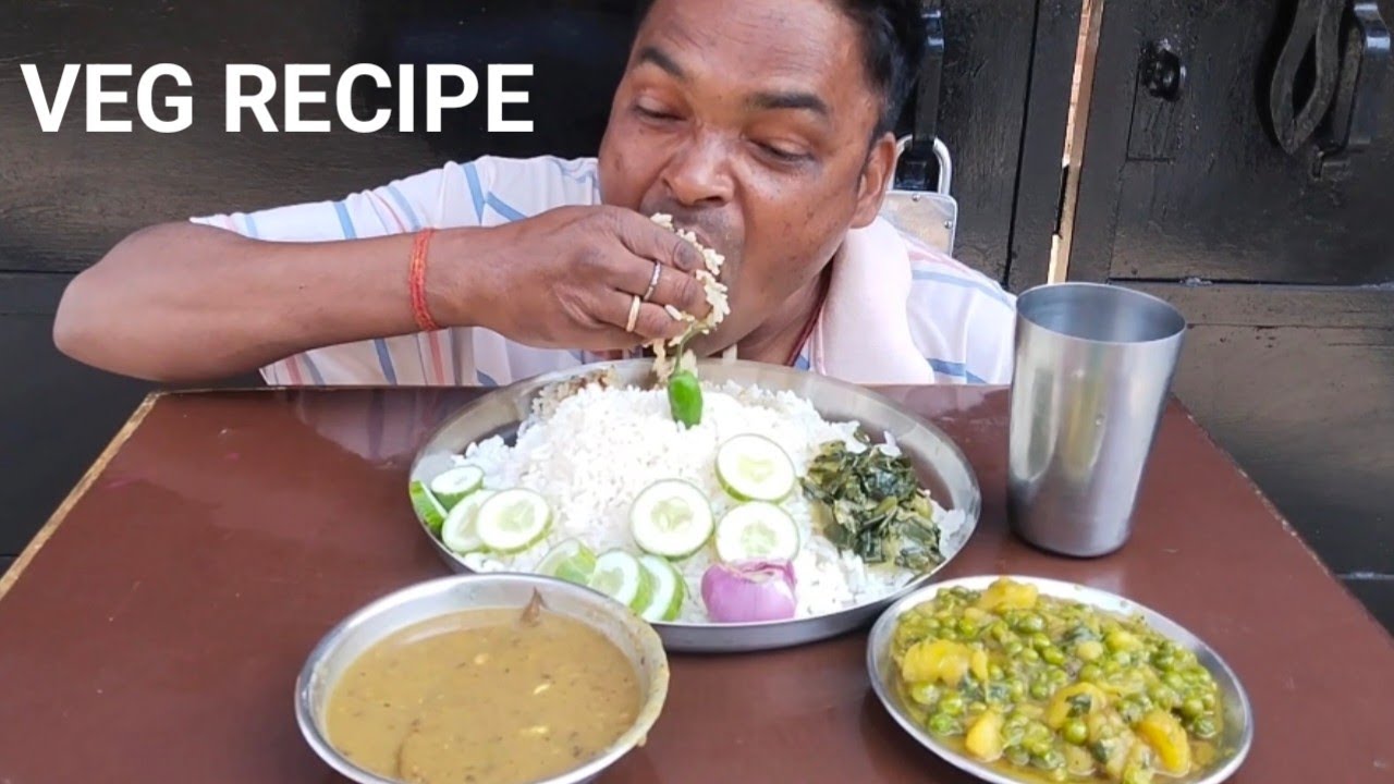 GREEN MATAR POTATO UNIONS SABJI DAAL RICE SALAD EATING.