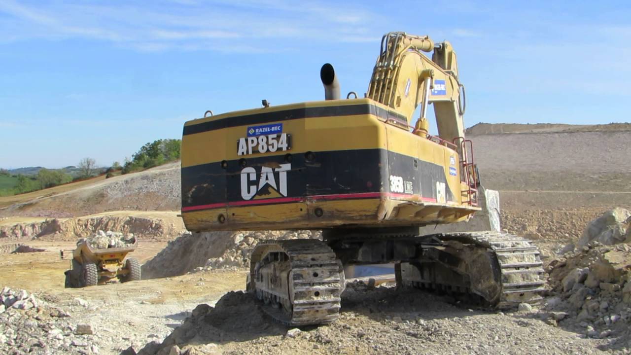 💪 High productivity - Caterpillar 385B loading Volvo A40F and Bell B45D  - Part 4