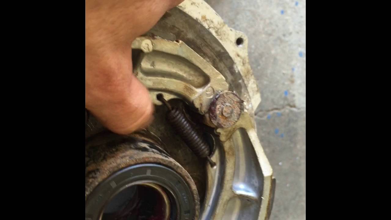 1999 Suzuki king quad 300 right rear brake and bearing rebuild part 2
