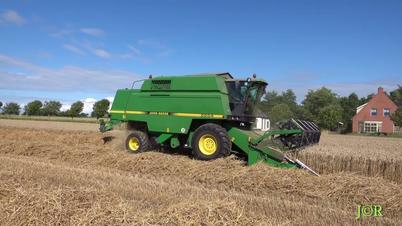 Ludolf en Klaas Pieter Rietema van Nije Ploats Hornhuizen  aan het dorsen van hun eerste perceel.