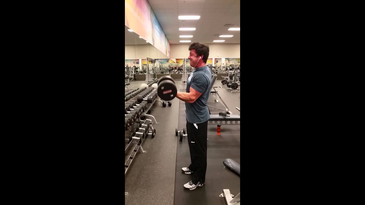 Bicep curling 80 lb dumbbells good form @ 6' 203