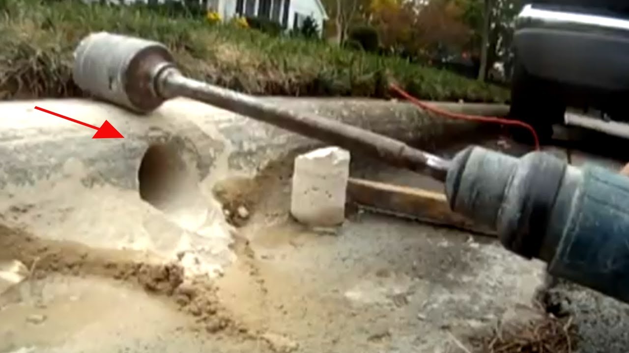 CORE DRILLING concrete CURB  for PVC Pipe Downspout Drain line discharge at the street