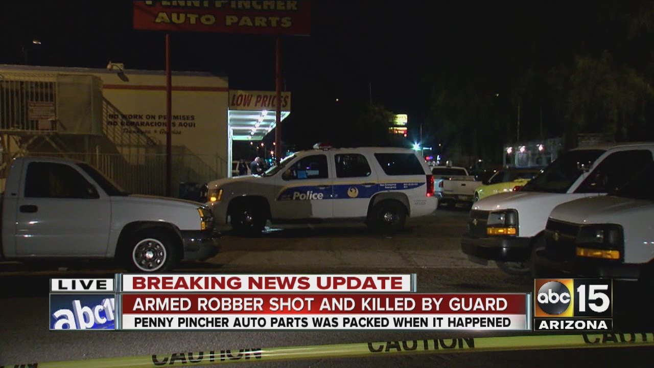 Armed robber shot and killed by guard