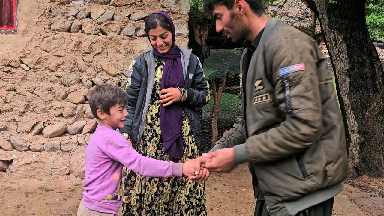 Leila and Shahin are fishing in the heavy rain, catching fish and Shahin's happiness.