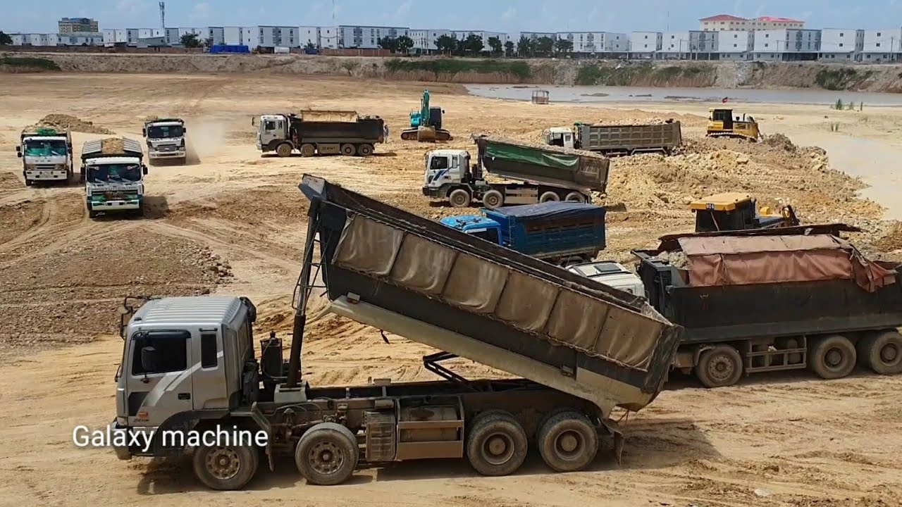 Wow! Amazing Lots of Dump truck unloding Dirt operator bulldozer SHANTUI pushing soil Dirt