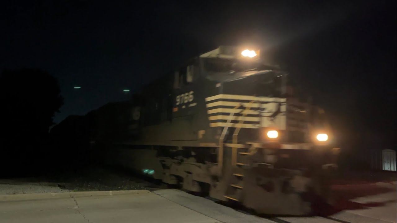 NS #9766 (C44-9W) & UP #6601 (AC44CW) lead NS 271 south through Trenton, MI (8/13/23)