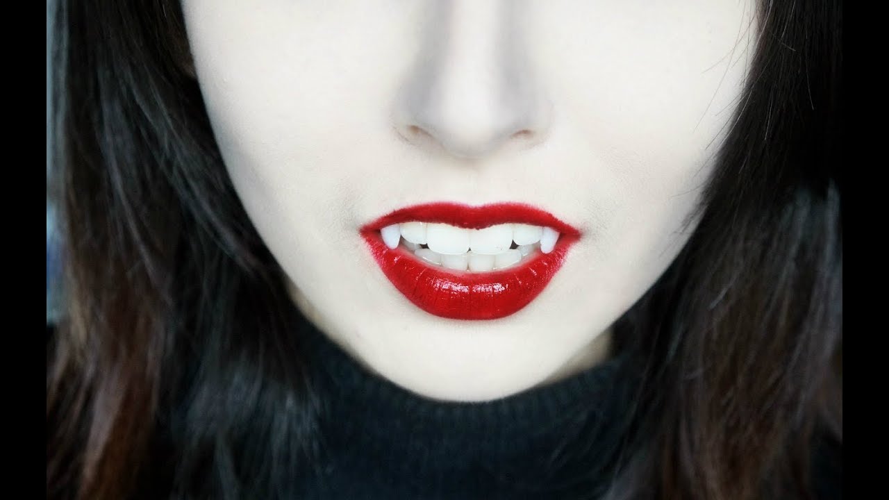 Como fazer dente de vampiro com unha postiça :3