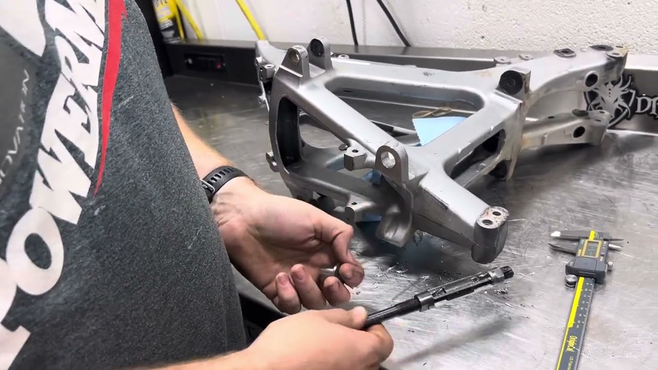 Yfzr Frame slop fix on a arm bolt.
