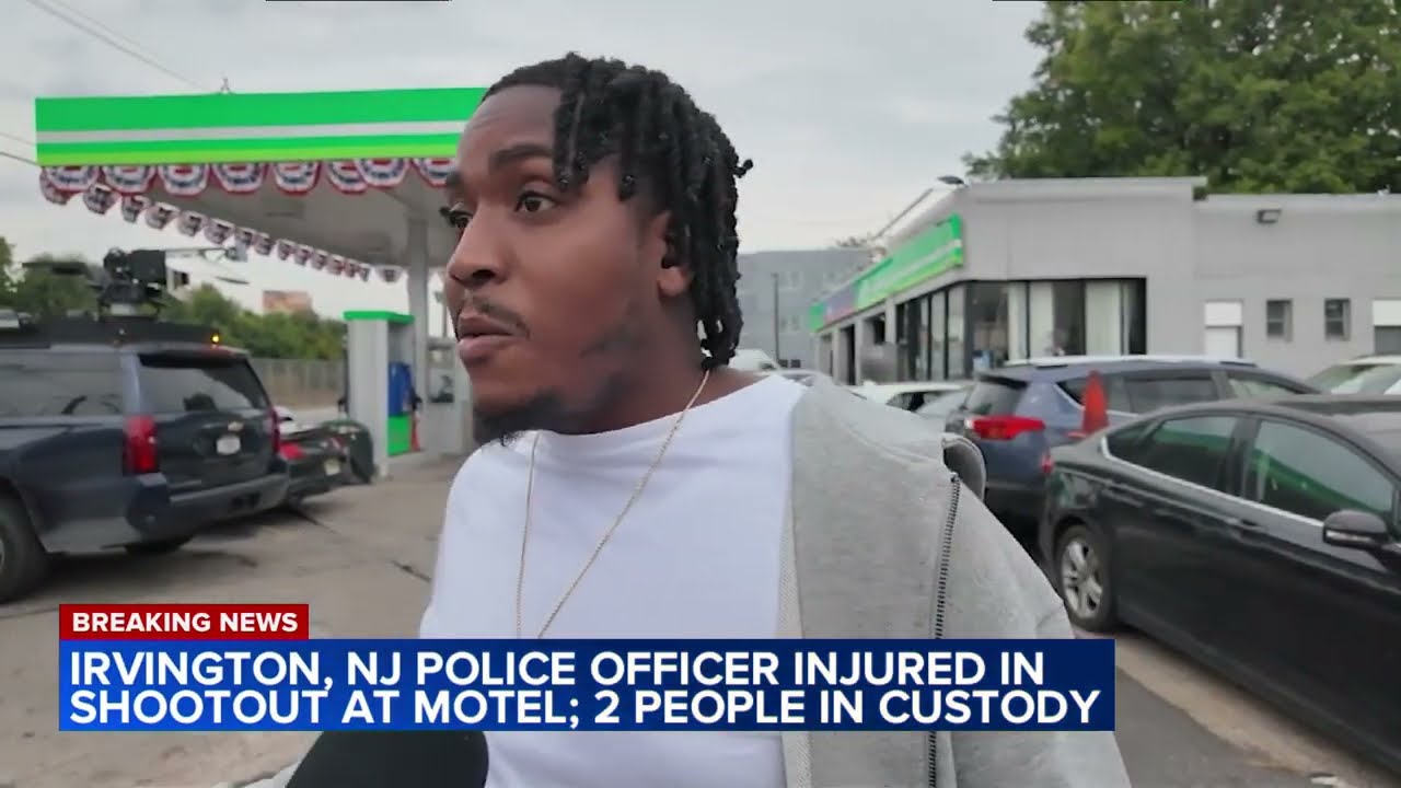 NJ officer shot in back during exchange of gunfire at motel