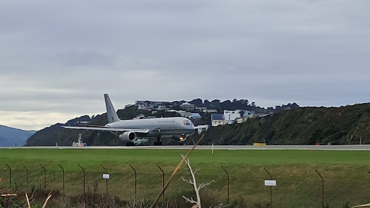 Weekend bundle of planes sunny and rainy windy weather at wellington international airport