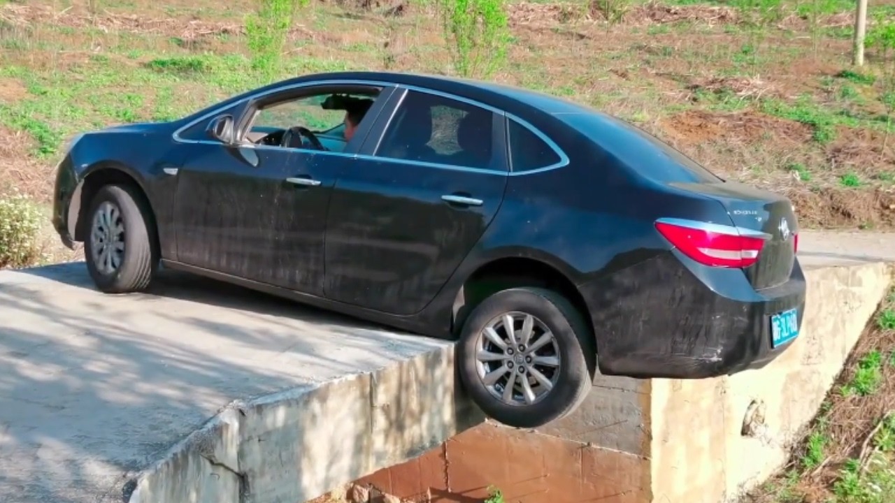 A Car Fell Off A Road Embankment While Crossing A Bridge; It Was Fixed With Stones