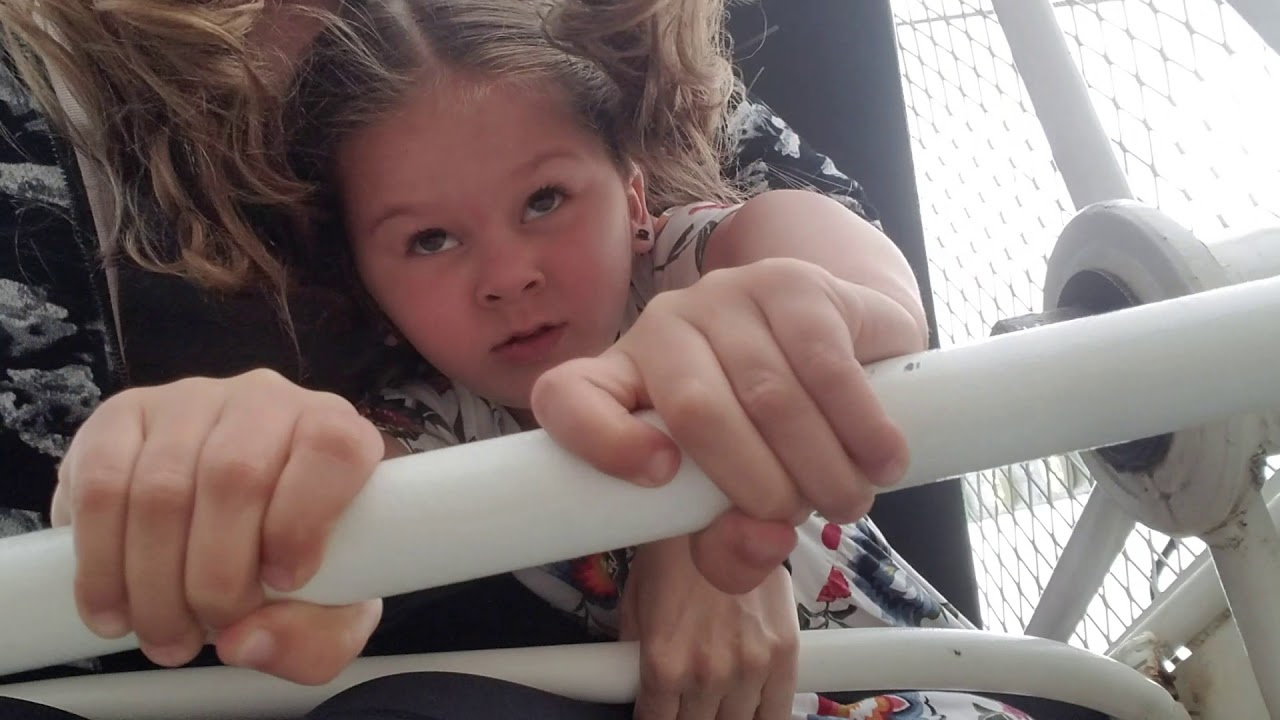 Ari rides the Scary Ferris Wheel.