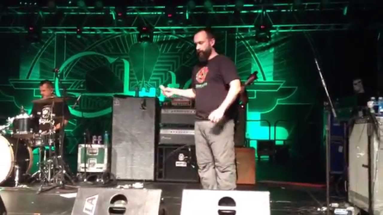 Clutch (Neil Fallon) tosses a girl puncher