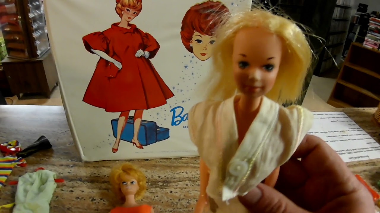 Vintage Barbie Lot, Case, Clothes and a Non-US Barbie, all came in from a Bungie Jumping Surveyor