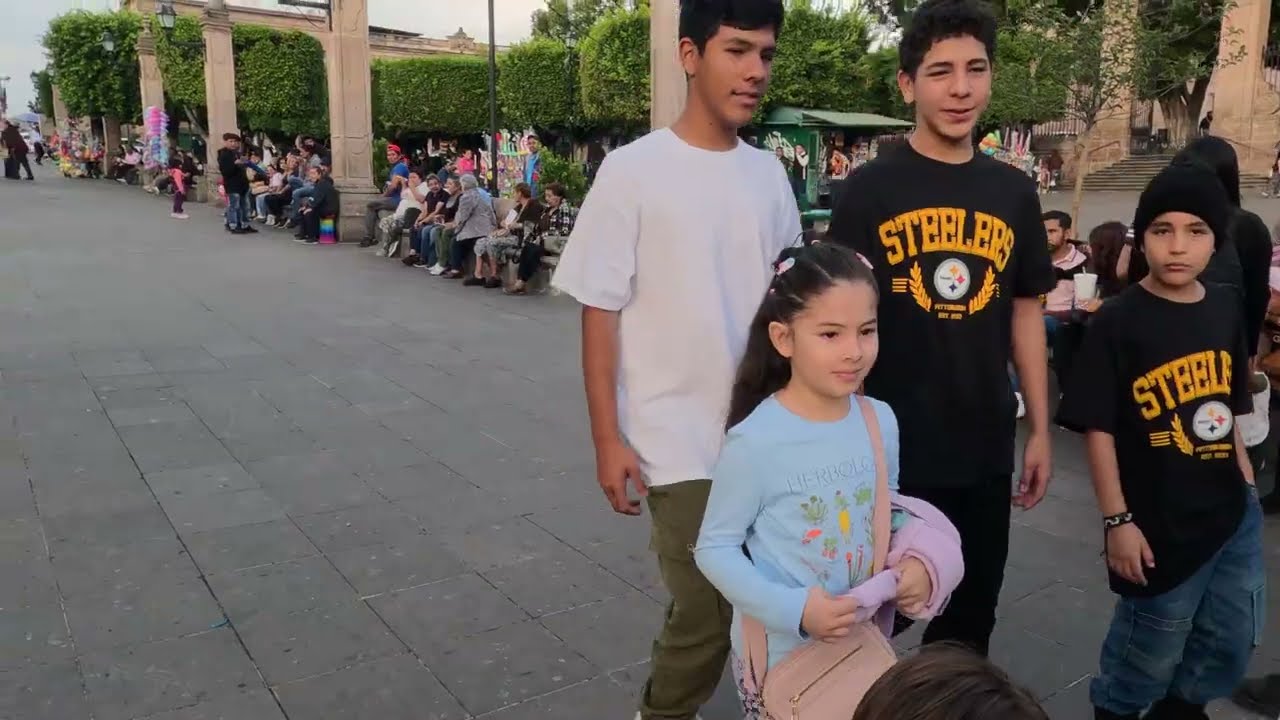 Morelia Mexico passing out tracts near busy park area