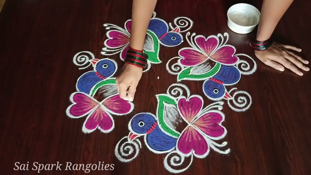 Beautiful birds with flower rangoli / creative birds kolam / latest pulli kolangal 