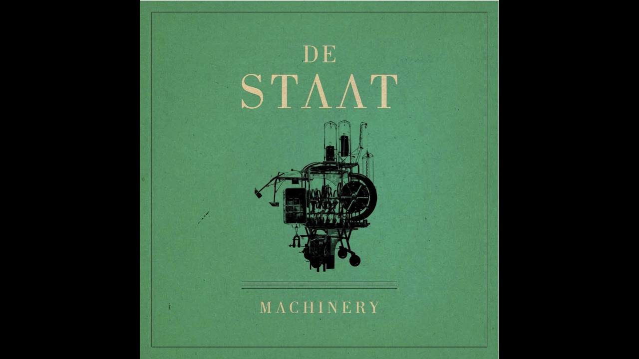 De Staat - Back To The Grind