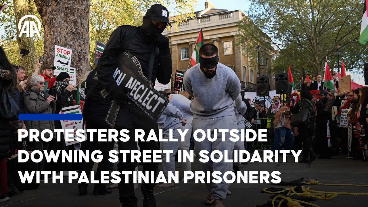 Protesters rally outside Downing Street in solidarity with Palestinian prisoners