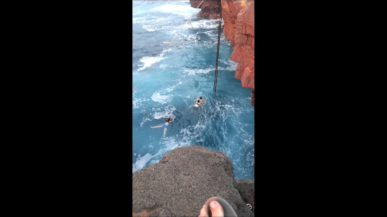Cliff diving at South Point, crazy swell