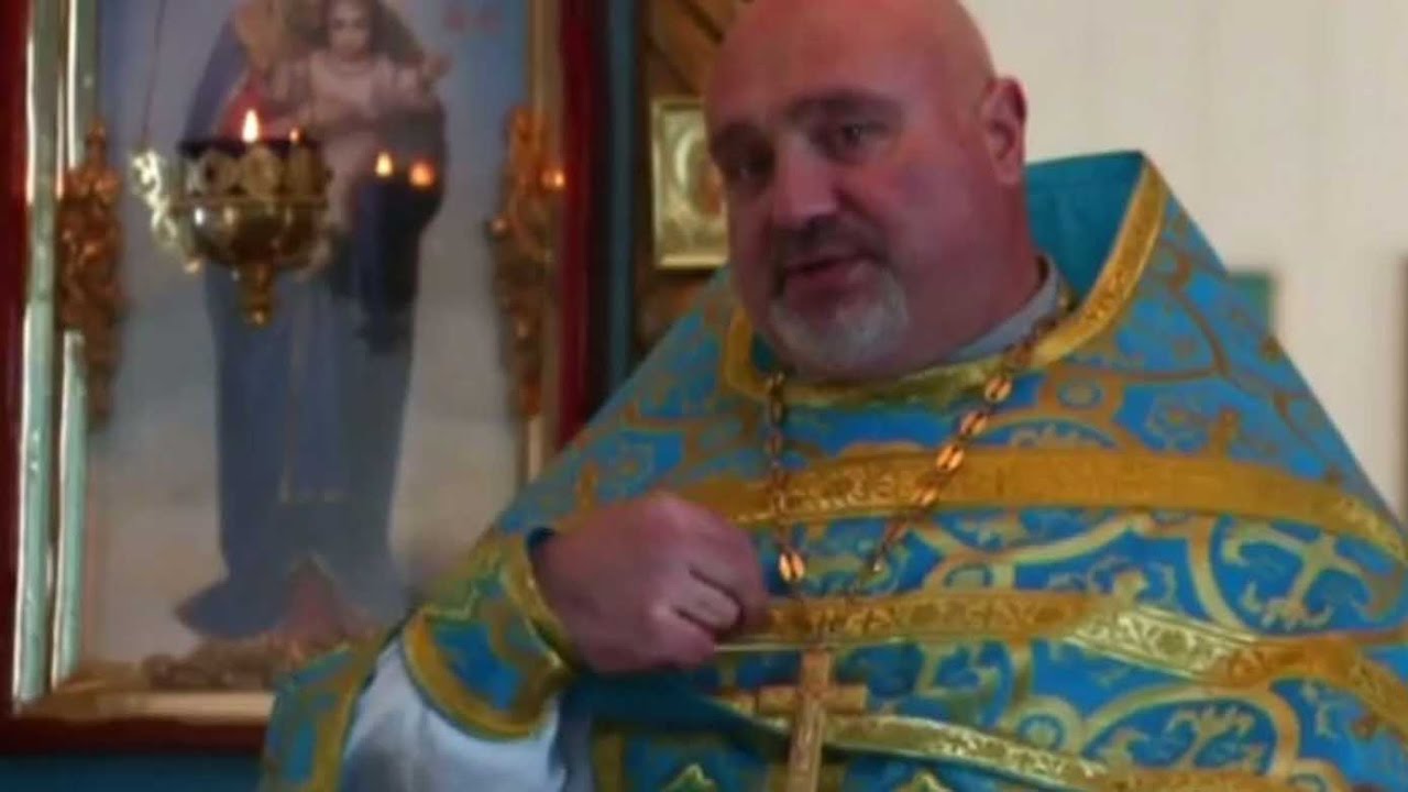 From faith to powerlifting, Ukraine priest inspires