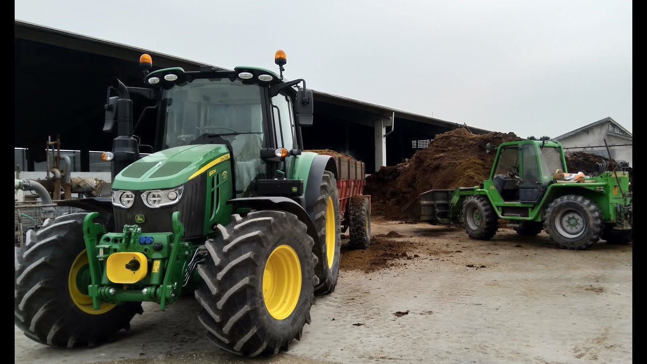On board John Deere 6120M| Merlo P28.9 EVT! spreading manure.