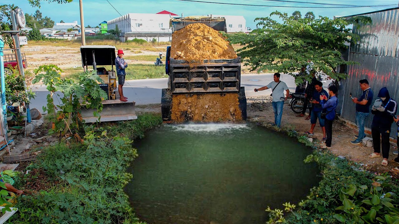 Start a New Project Completed 100%! Landfill on Flooded Area by Dozer D20A & 5Ton Truck Push Soil