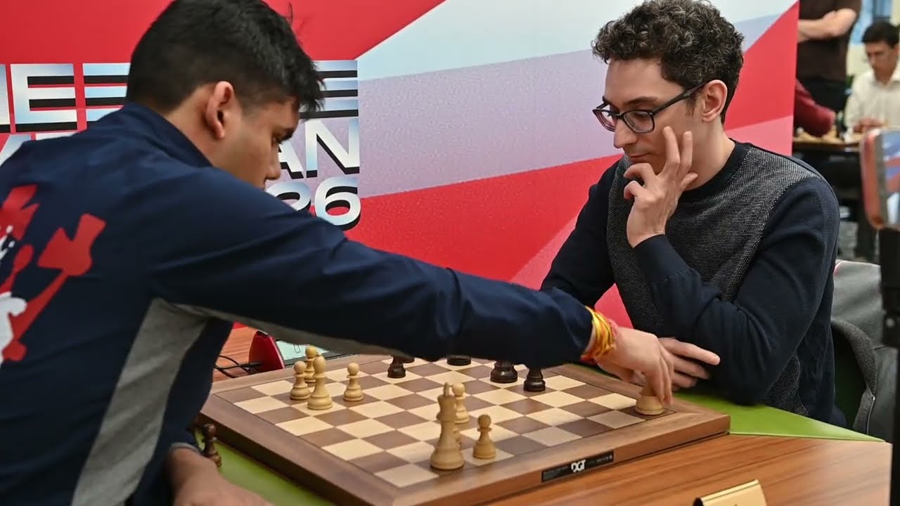 Crazy blitz ending where Mishra's bishop goes flying but still defeats Caruana in round 3