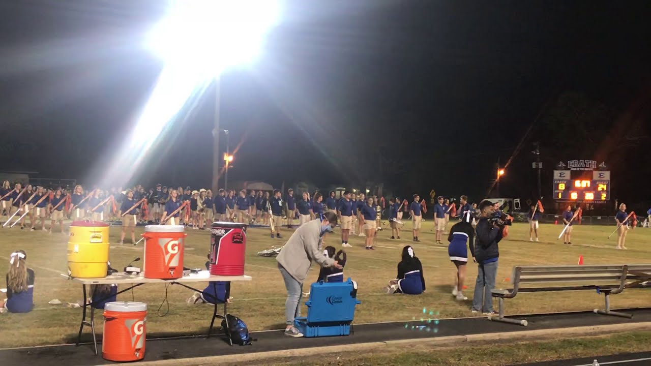 Erath high school band playing a journey song called “Don’t stop believing” with fight song