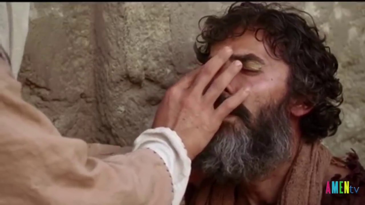 Chúa Giê-su chữa một người mù từ thuở mới sinh - Jesus heals a man blind from birth.