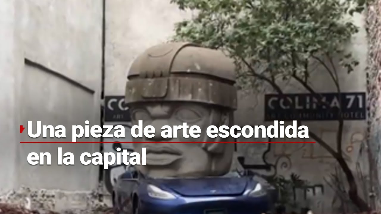 ¿Arte en la vía pública? | Cabeza olmeca aplasta a un automóvil en calles de la Roma, #CDMX