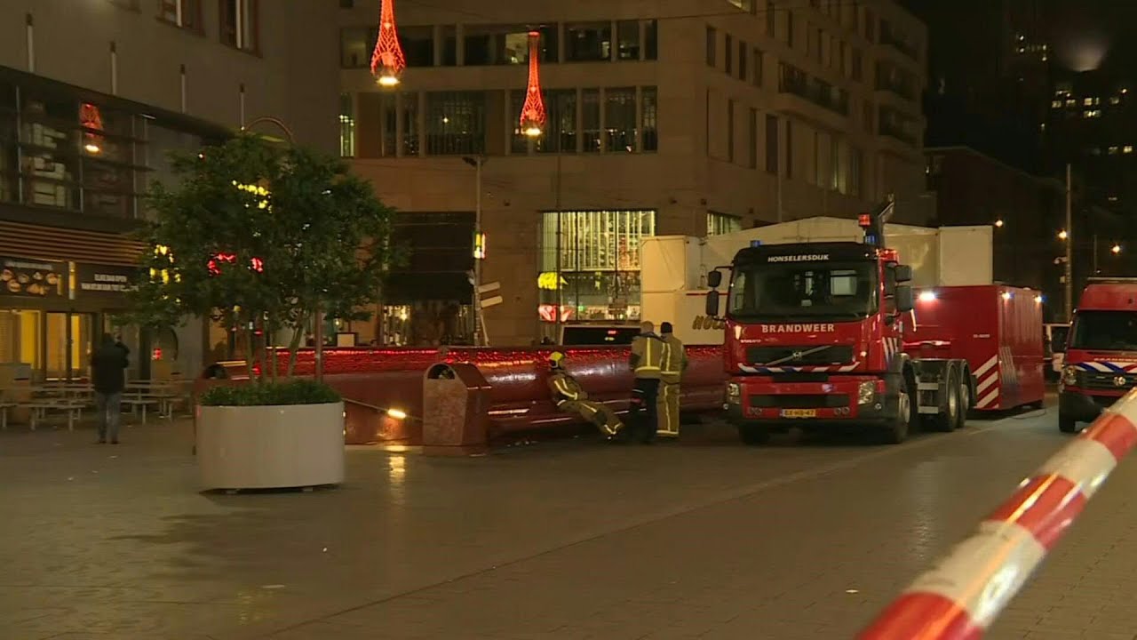 Emergency services at the scene of Hague stabbing | AFP