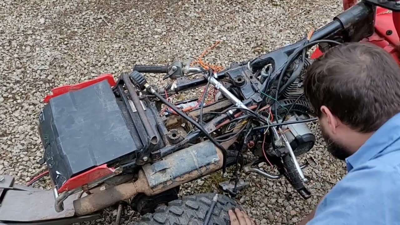 How to do a compression test on a Honda Three wheeler.