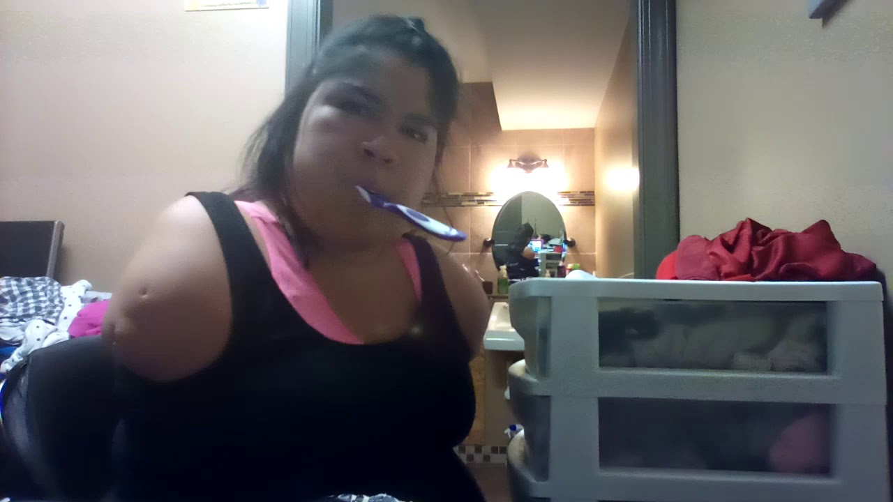 Brushing my teeth close up