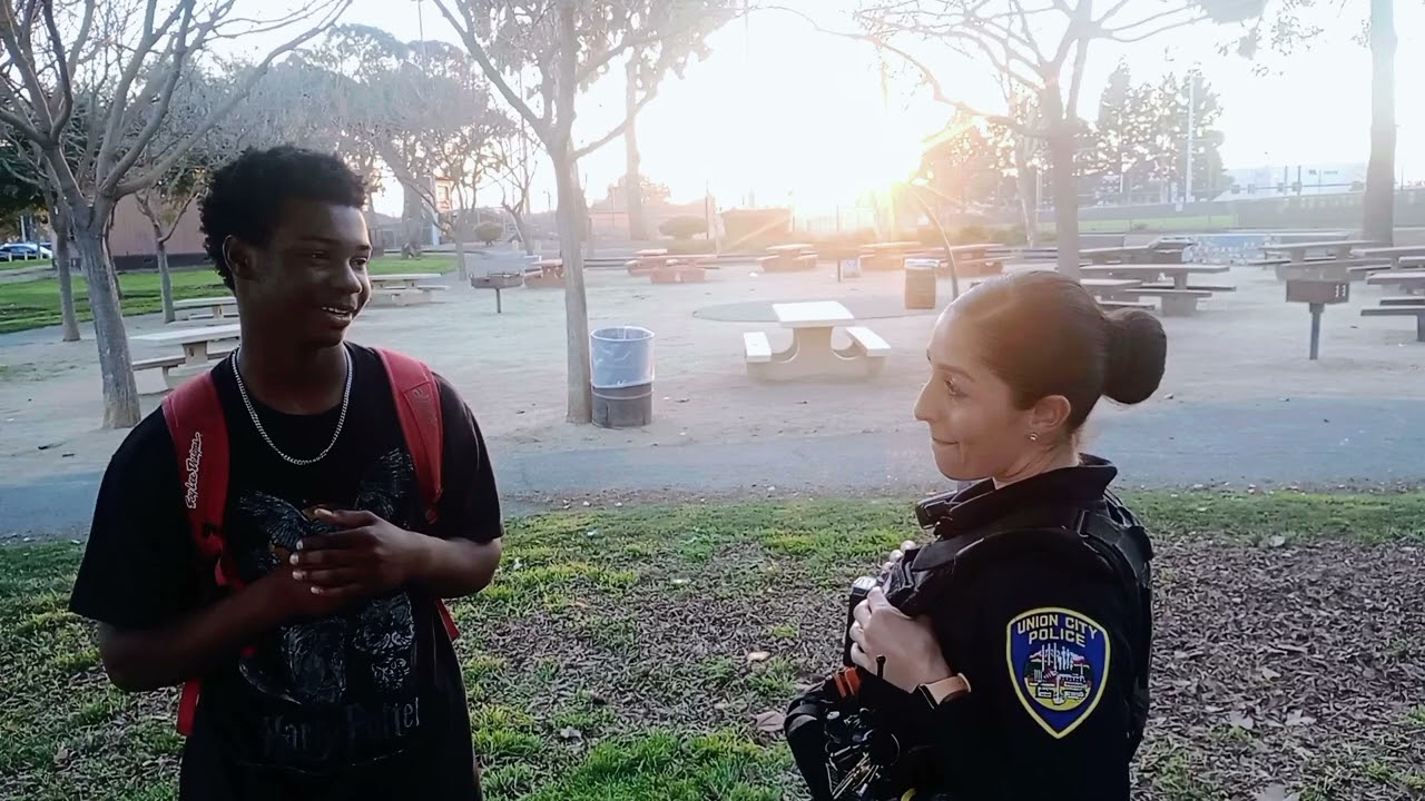 (Student interview) with a female police officer.