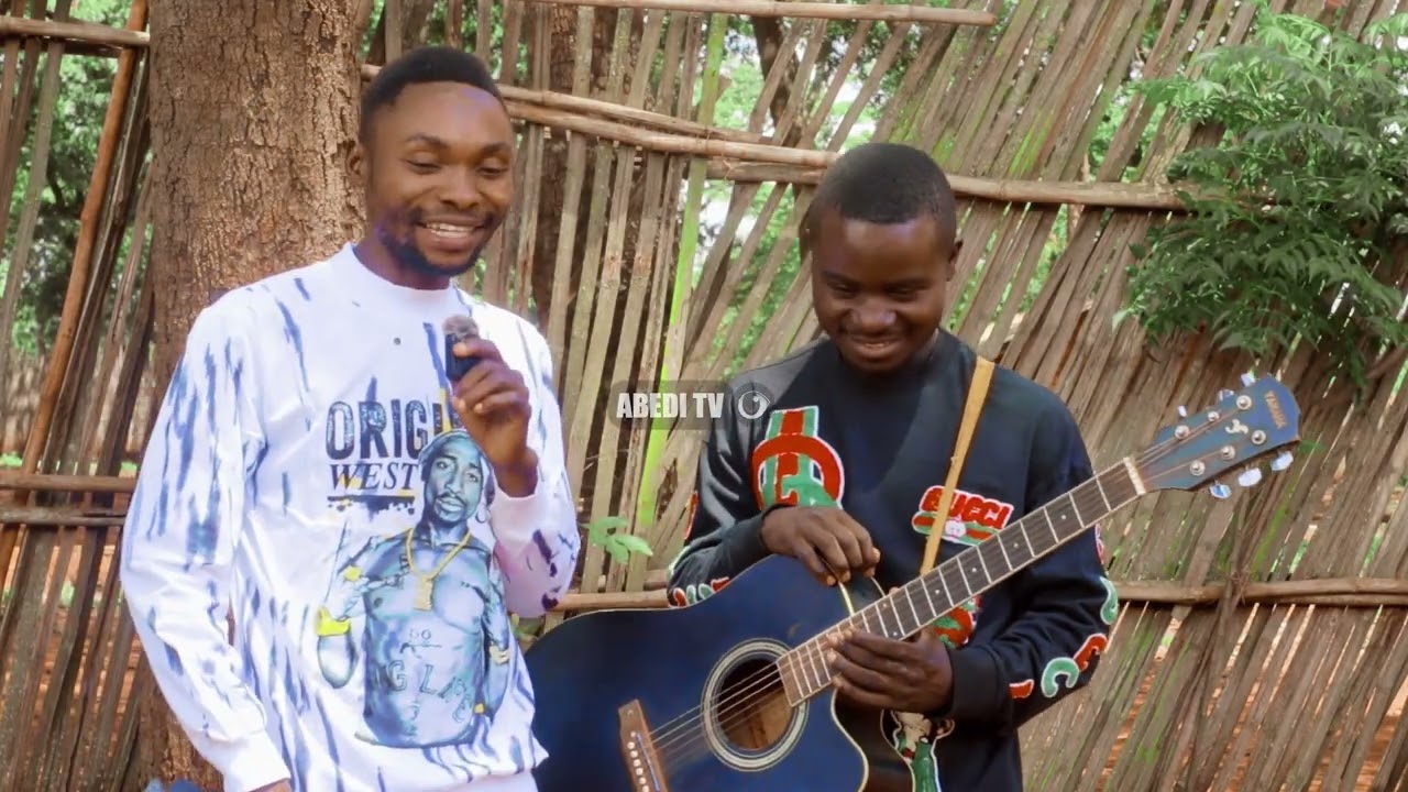 MPIGA GUITAR WA DEACKY REALLY AELEZA ALIVYO KUTANA NAE NA KUFANYA KAZI PAMOJA