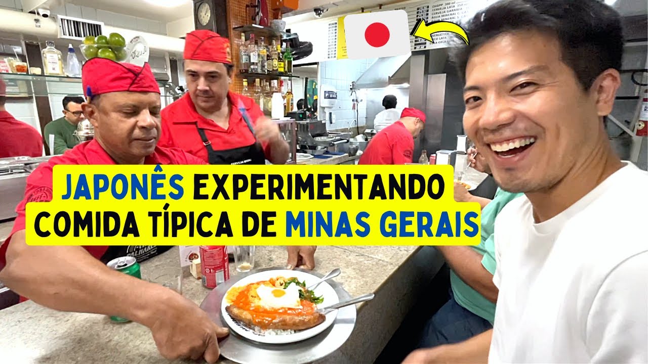 Japonês experimentando comida típica de Minas Gerais