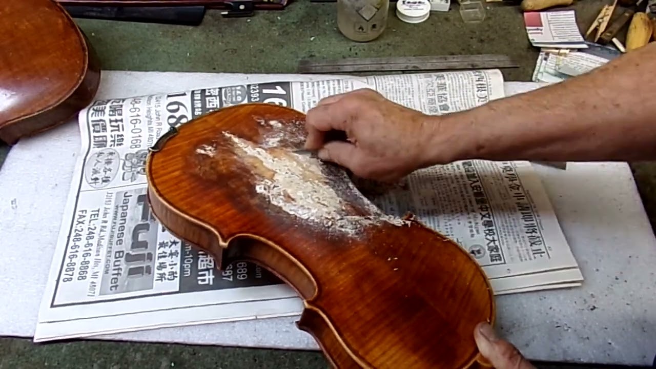 Violin with plastic wood