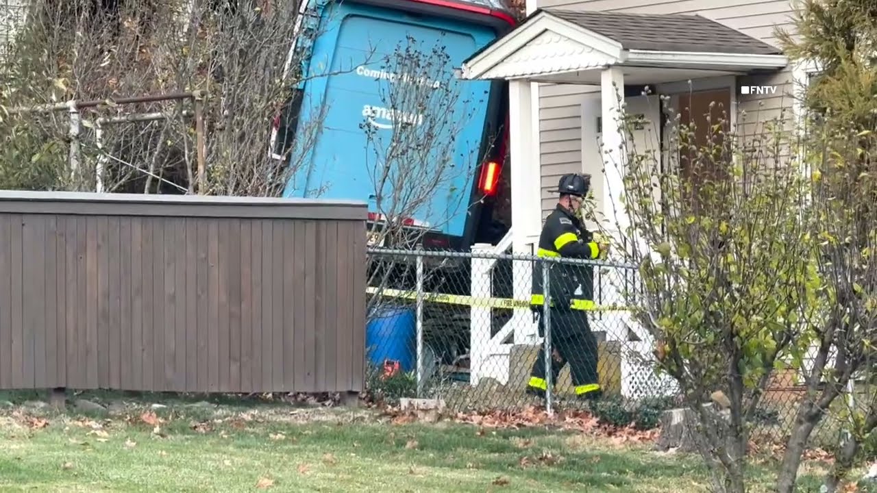 Amazon Truck Rolls off Cliff into Shed - North Haledon NJ