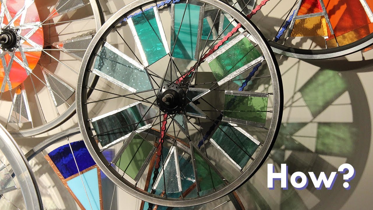 Deep Dive: motorized kinetic art bicycle wheel sculpture. Stained glass, 15 wheels!