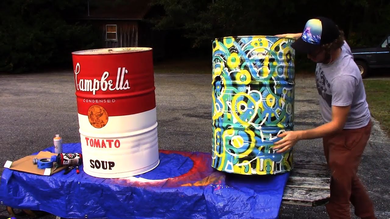 Peter Paints on a couple barrels (spraypaint)