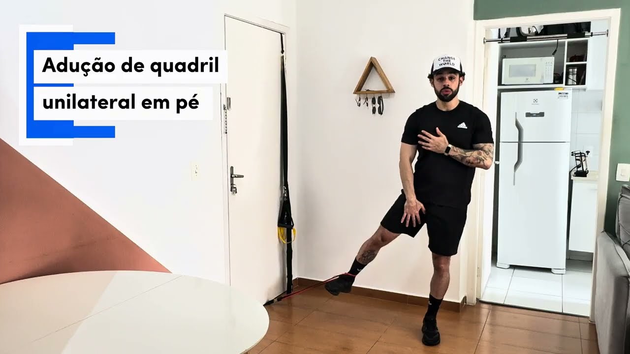 Adução de quadril unilateral em pé - (Com elástico)