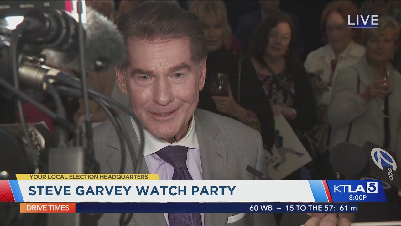 Republican Steve Garvey speaks to reporters as polls close