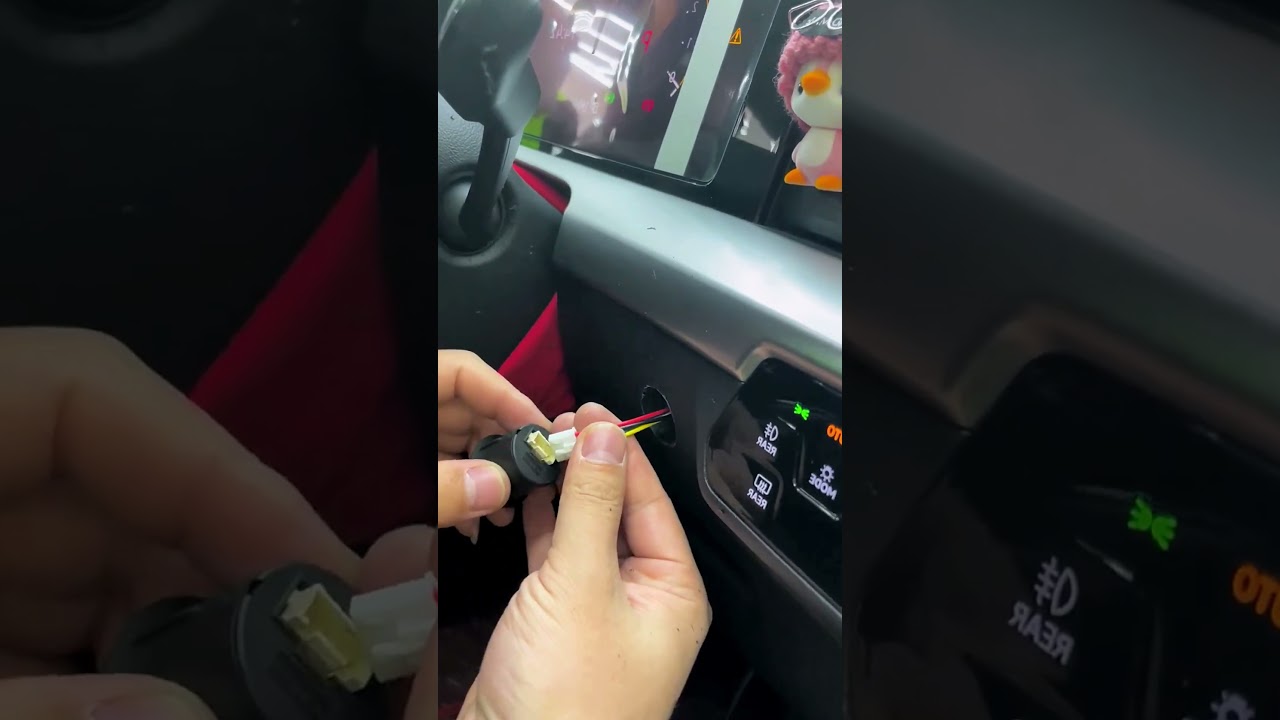 Car installs heated seat button- Good tools and machinery make work easy