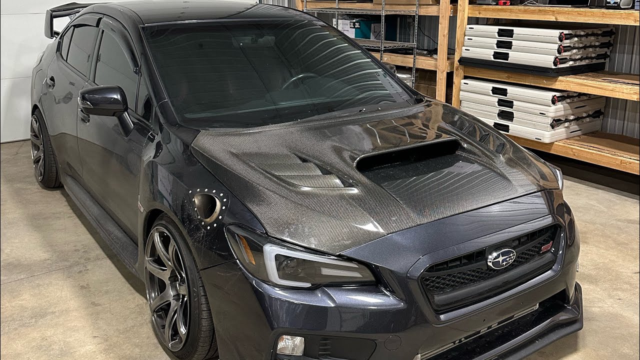 STI GETS CARBON HOOD