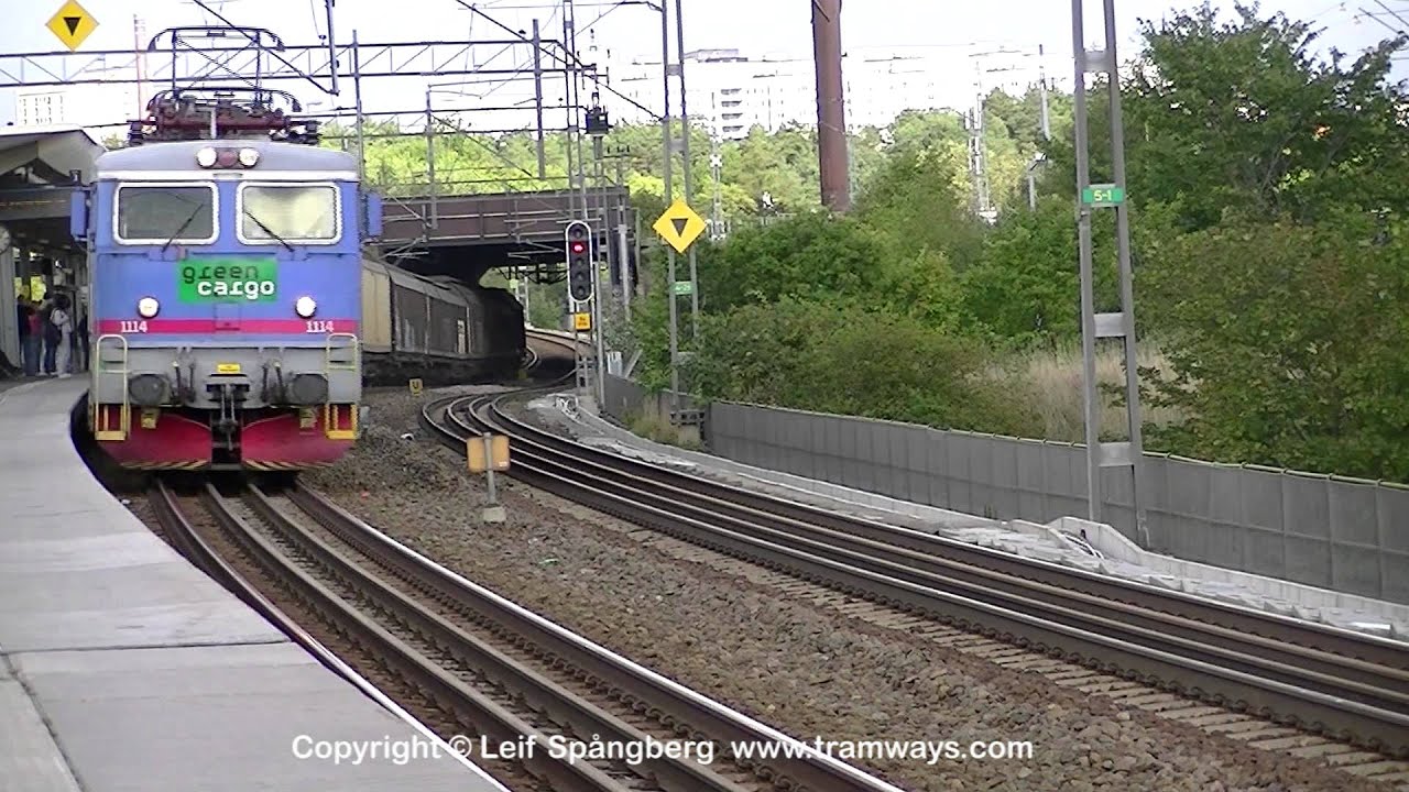 Green Cargo Rc2 1114 passing &Aring;rstaberg with freight train, Stockholm