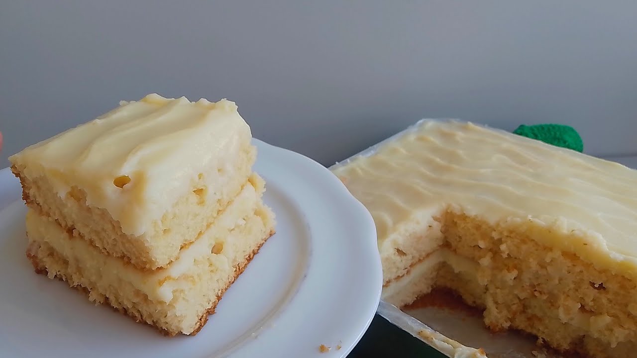 BOLO DE LEITE NINHO COM RECHEIO DE BABA DE MOÇA