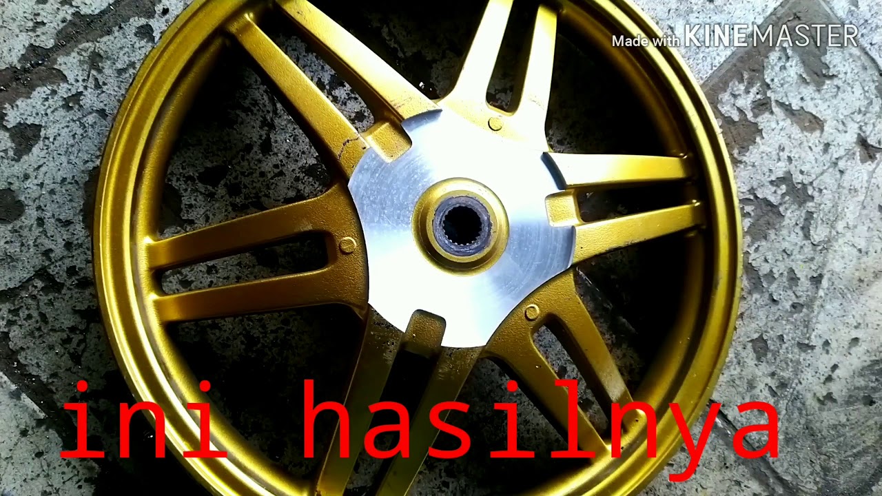 Proses pemasangan cakram belakang pada motor metic suzuki spin 125