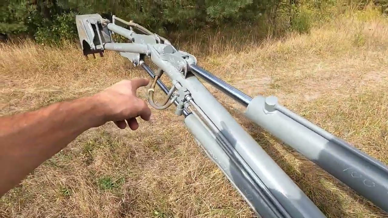 Экскаватор из трубы для Т-25. Обзор